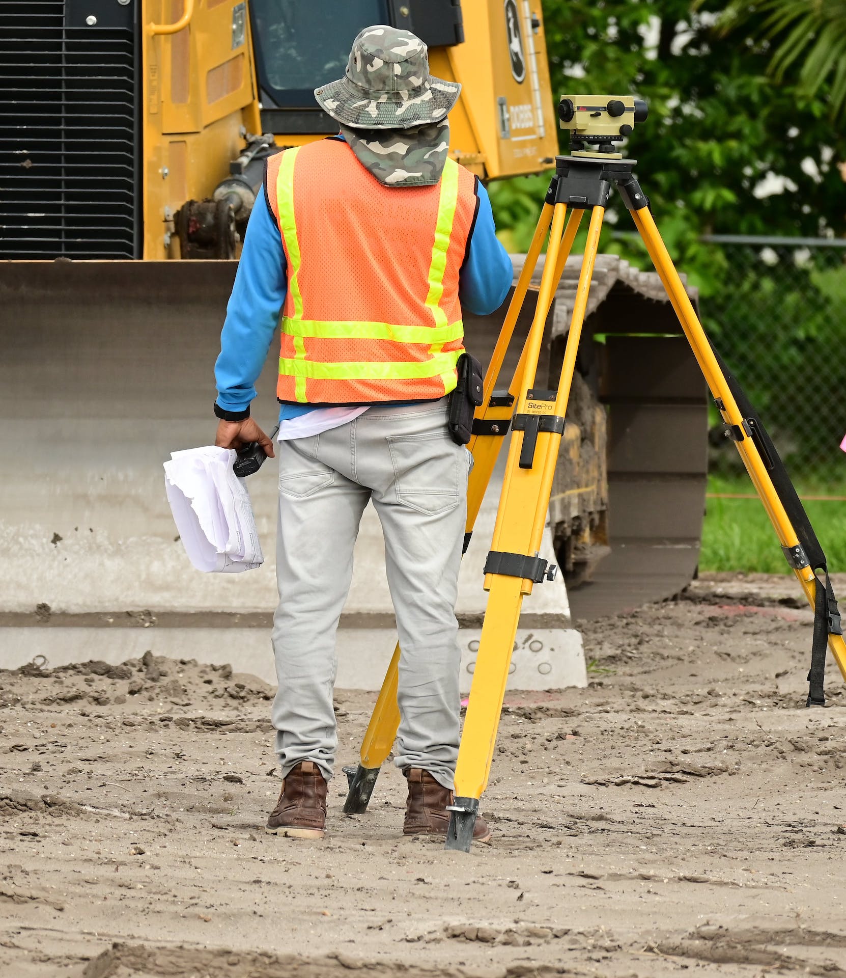 Surveyor assessing land
